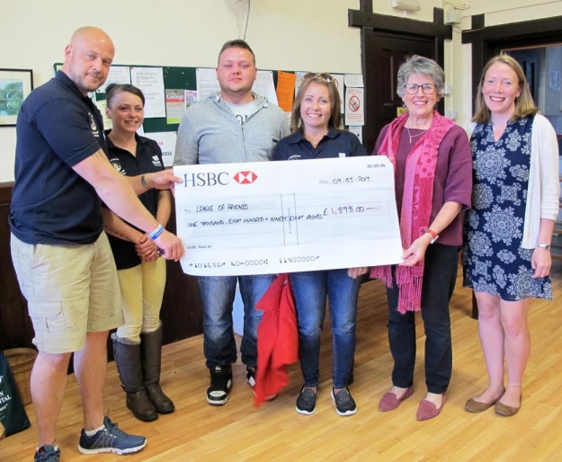 Helen Chaloner and Jo Moore receiving a cheque for £1898 on behalf of the League of Friends from Lee Riva and family.