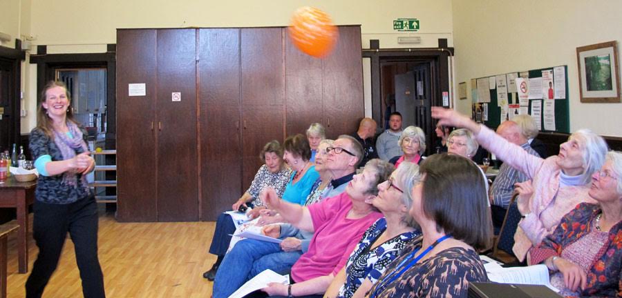 Vanessa Martin illustrating her presentation with some balloon therapy!