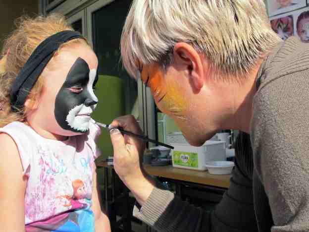 Children of all ages enjoyed the artistic face-painting.
