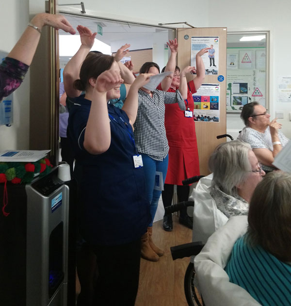 Staff performing 'The Twelve Days of Christmas'